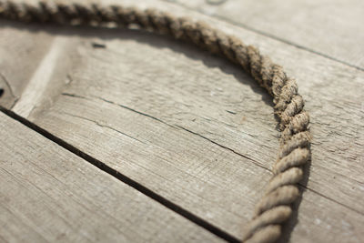 High angle view of wooden plank on table