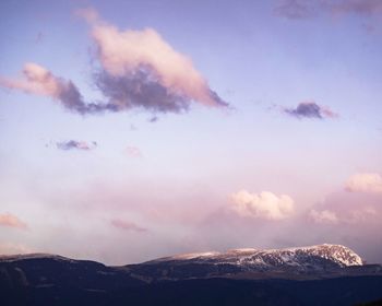 Scenic view of mountains against sky during winter