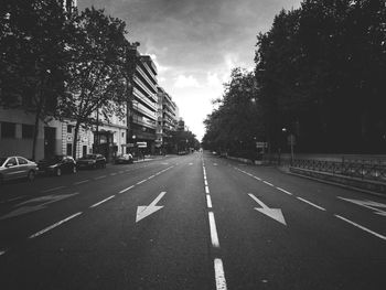 Road in city against sky