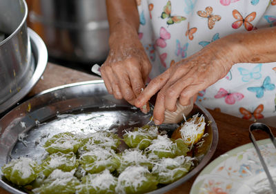 High angle view of person preparing food in kitchen