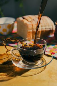 Tea pouring in cup