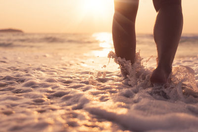 Low section of person on beach