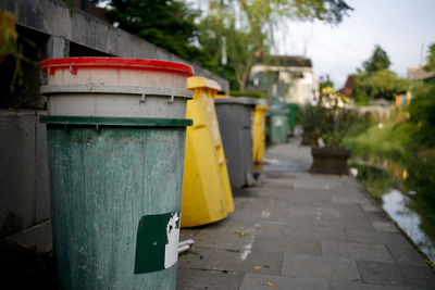 Footpath by sidewalk in city
