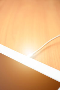 High angle view of light bulb on table