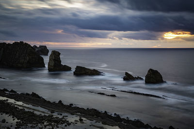 Scenic view of sea against sky during sunset