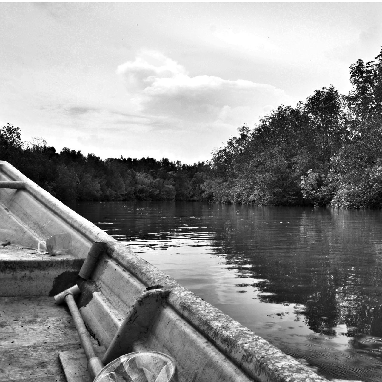 tree, water, sky, lake, cloud - sky, tranquility, river, tranquil scene, nature, cloud, pier, built structure, beauty in nature, scenics, reflection, day, nautical vessel, outdoors, transportation, wood - material