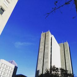 Low angle view of modern building against clear sky