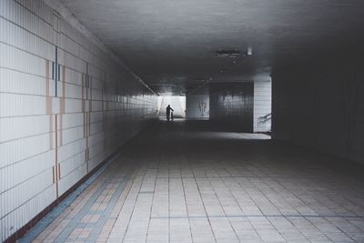 Empty subway with tiled walls