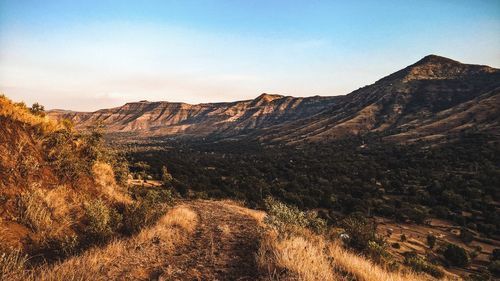 Scenic view of mountain range against sky