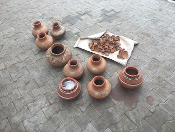 High angle view of pots on footpath