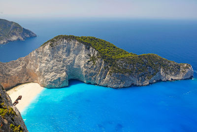 High angle view of rock in sea