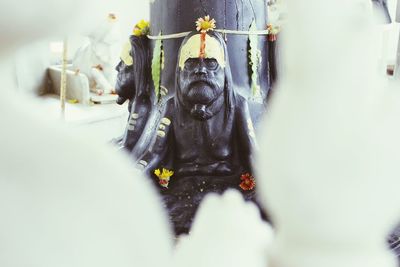 Close-up of buddha statue in temple