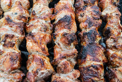 Full frame shot of meat on barbecue