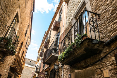 Low angle view of old buildings against sky