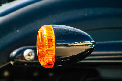 Close-up of reflection of car in mirror