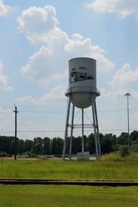 Low angle view of water tower against sky