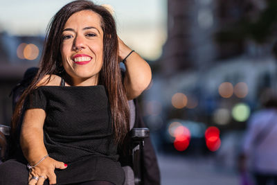 Portrait of smiling woman outdoors