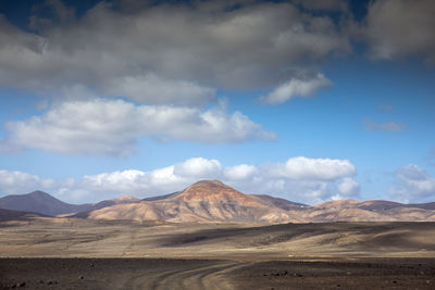 Scenic view of desert against sky