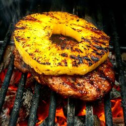 Close-up of meat on barbecue grill