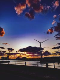 Scenic view of silhouette land against sky during sunset