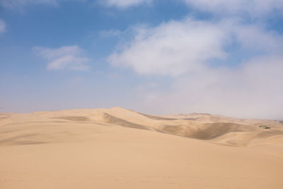 Scenic view of desert against sky