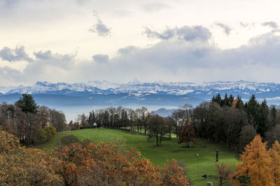 Scenic view of field against sky during autumn