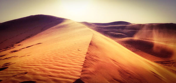 Scenic view of desert against sky