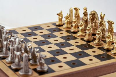 Close-up of chess pieces on table