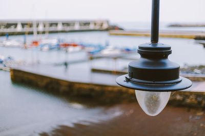 Close-up of boat moored in water