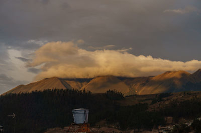 Scenic view of mountains against sky during sunset