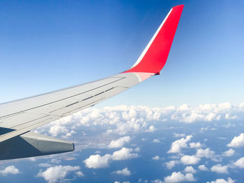 Low angle view of airplane flying in sky