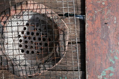 Close-up of metal grate on wall