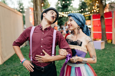 Young couple standing outdoors