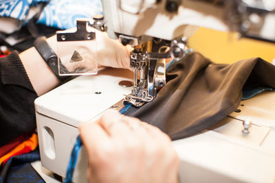 Midsection of woman working on table