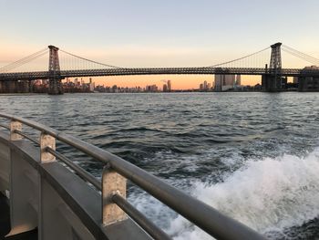 View of suspension bridge over sea