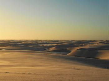 Scenic view of desert against clear sky