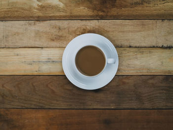 High angle view of coffee cup on table