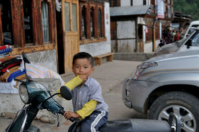 Portrait of boy in car