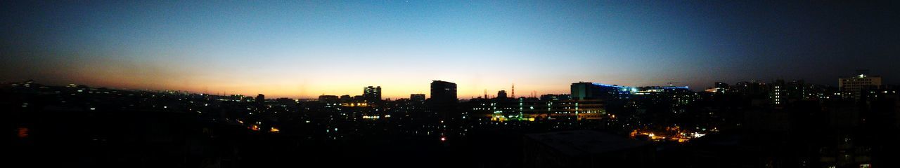 Illuminated cityscape at night