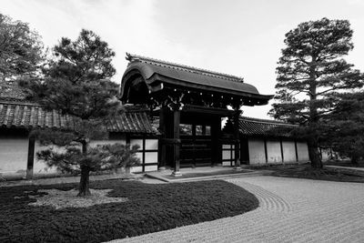 Gazebo by building against sky