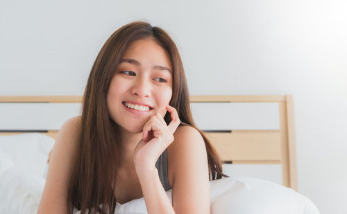 Portrait of a smiling young woman