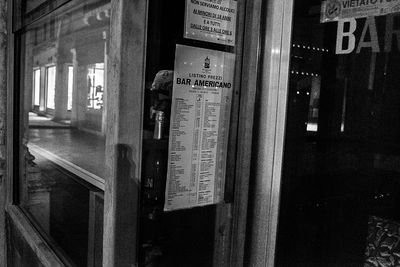 Close-up of text on window