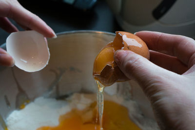 Cropped image of hand holding glass