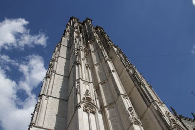 Low angle view of traditional building against blue sky