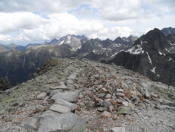 Scenic view of tatra mountains against cloudy sky