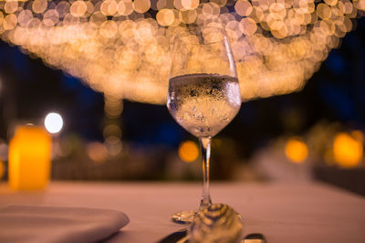 Close-up of wine glass on table