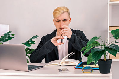 Businesswoman working at desk in office