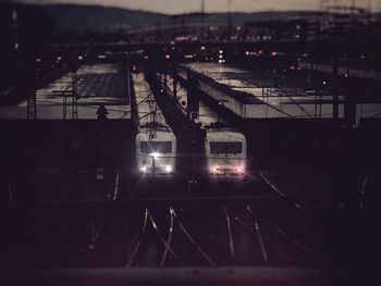 High angle view of train at railroad station at night
