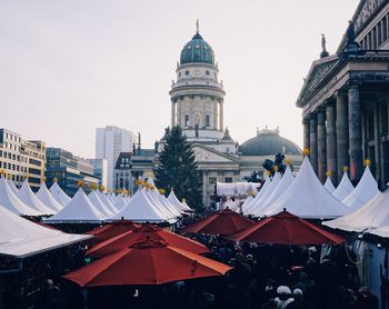 View of cathedral in city against clear sky