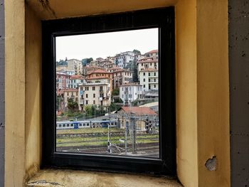 Buildings seen through window